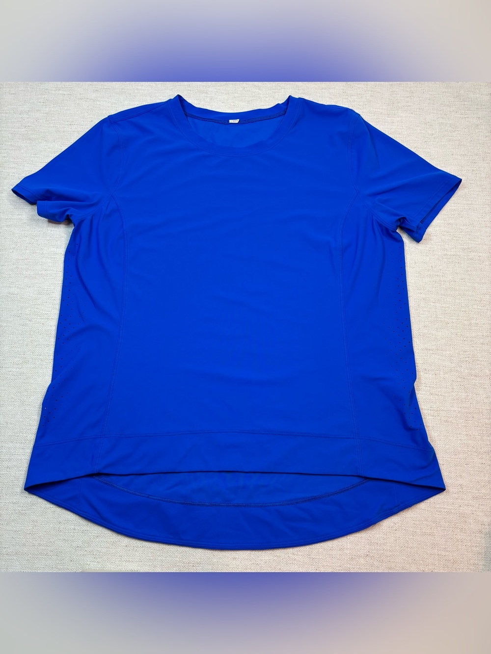 Lululemon women size 6 short sleeve athletic shirt in cobalt blue